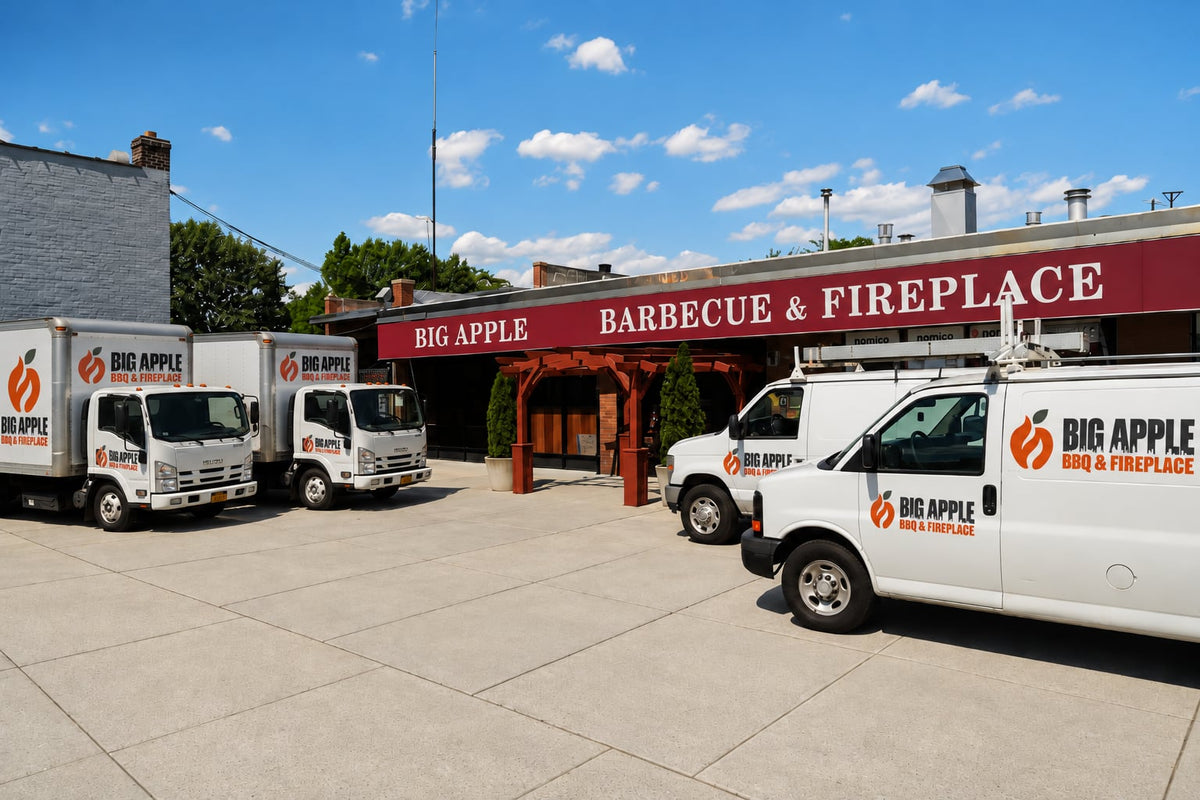 Big Apple BBQ & Fireplace showroom in East Elmhurst, Queens, with delivery trucks and vans