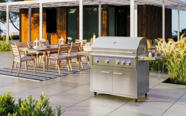 Outdoor kitchen with a stainless grill on a city patio